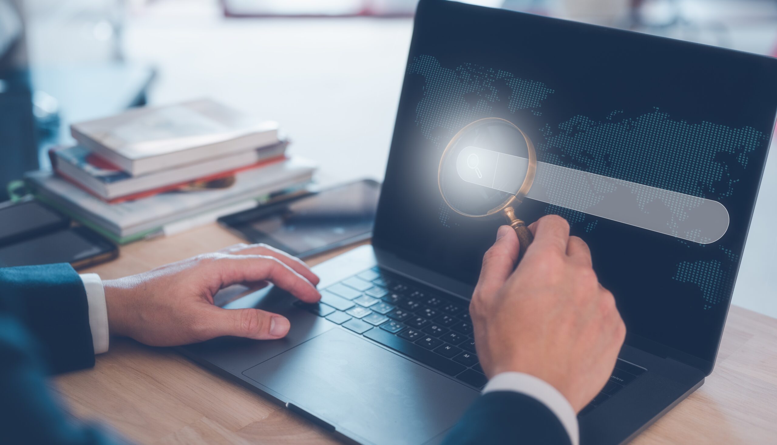 Search,Engine,Concept,,Businessman,Working,On,Computer,Laptop,Holding,Magnifying